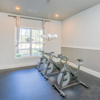 Cycling room with three cycle bikes